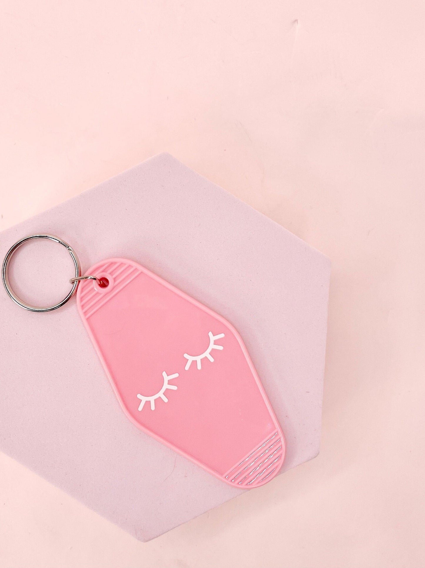 lash pink motel keychain
