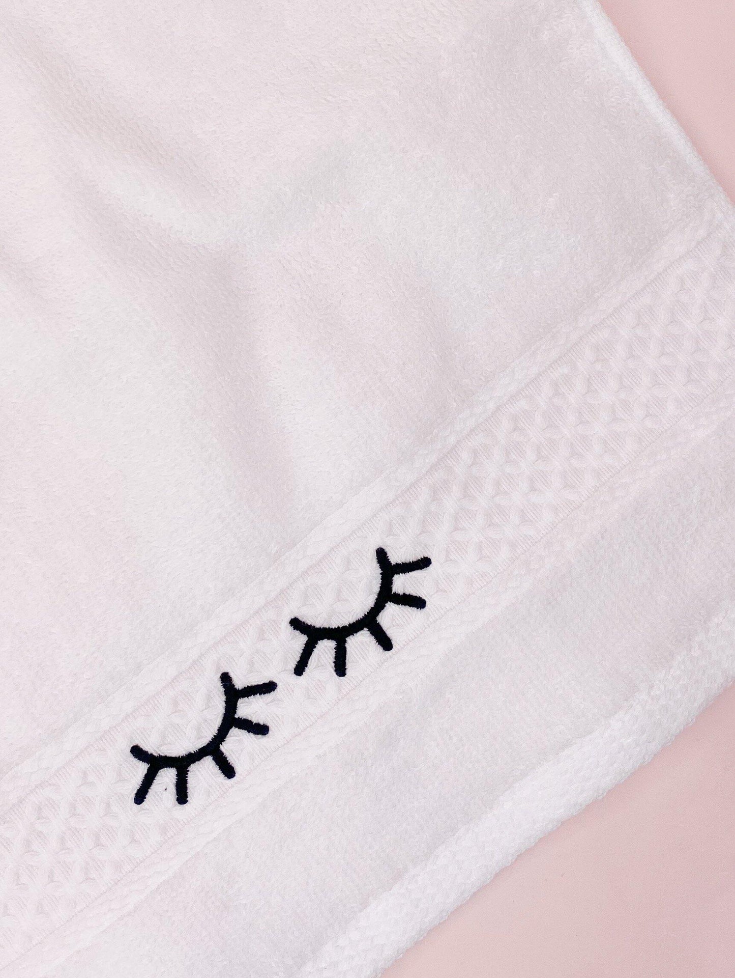 embroidered lash face towel
