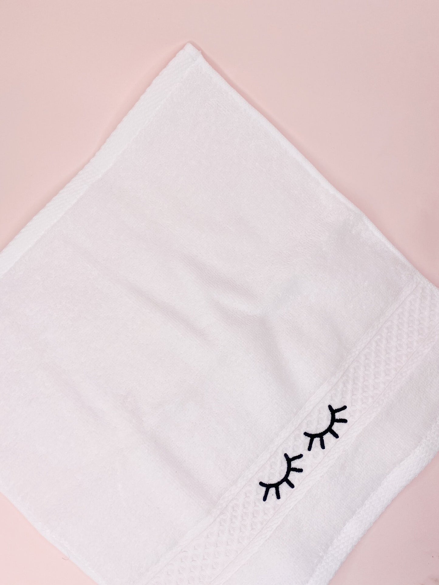 embroidered lash face towel