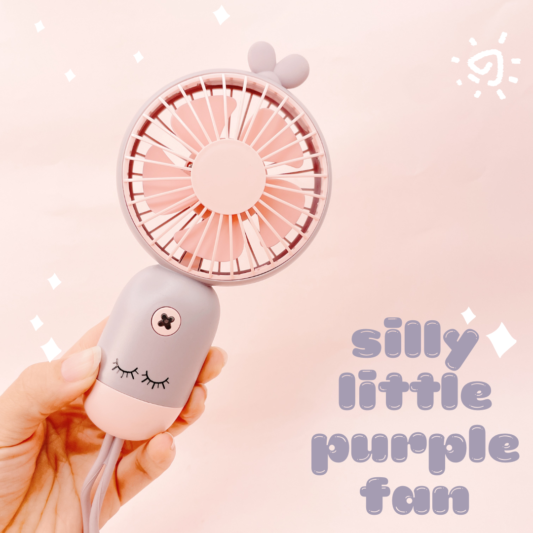 silly little handheld fan w-lashes