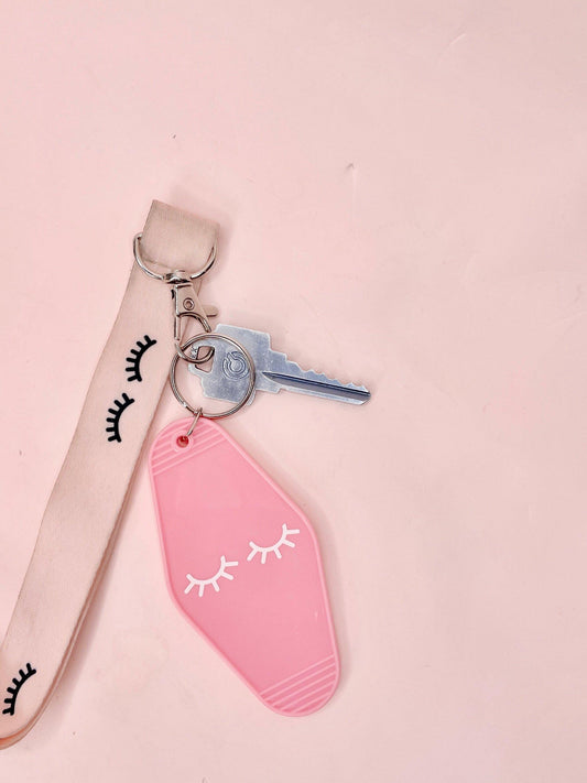 lash pink motel keychain